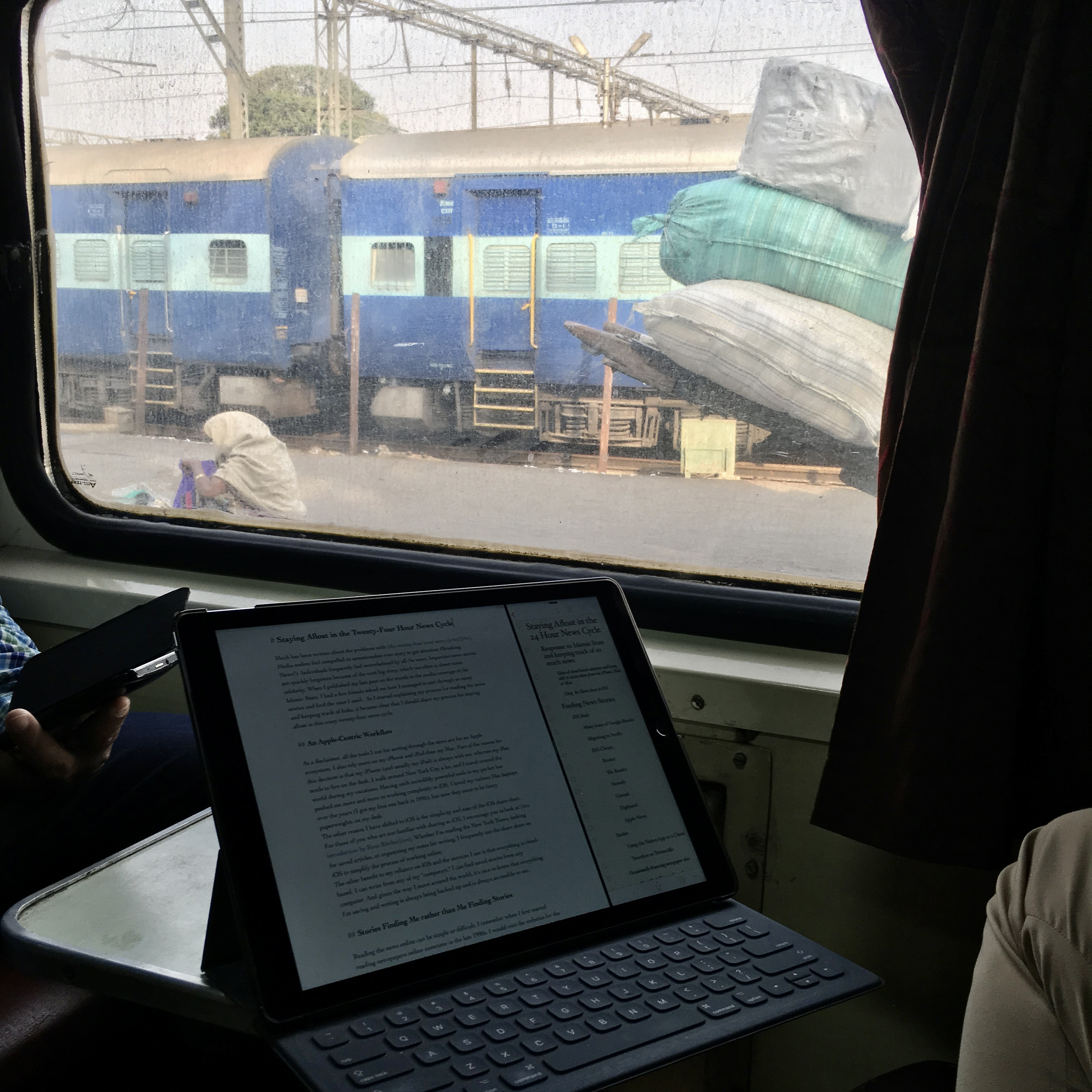 Writing on a train in India in 2016
